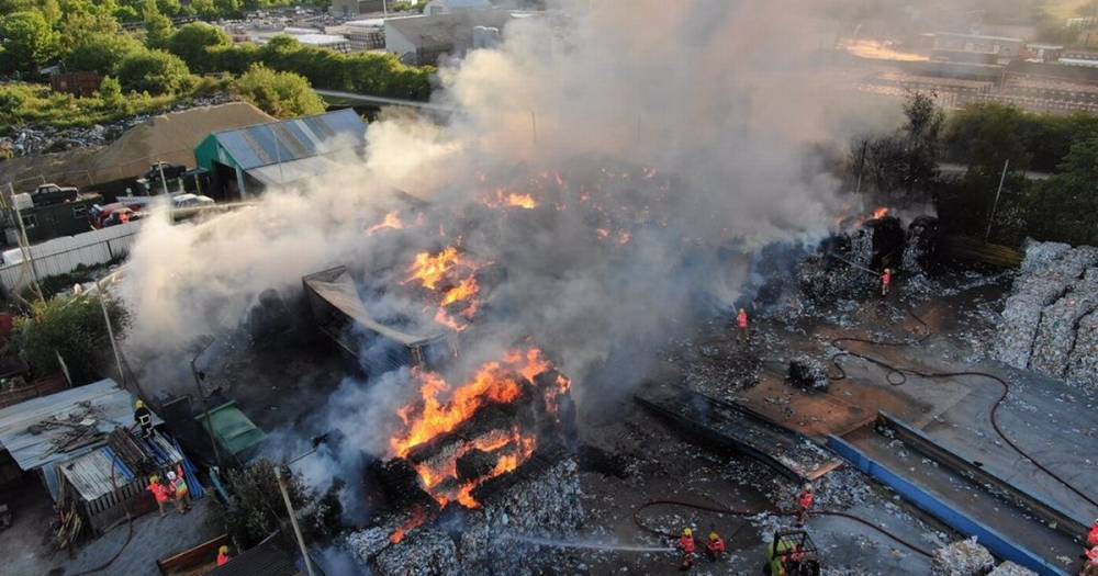 Firefighters continue to battle huge paper fire at industrial estate in Wigan - www.manchestereveningnews.co.uk - Manchester - county Lane