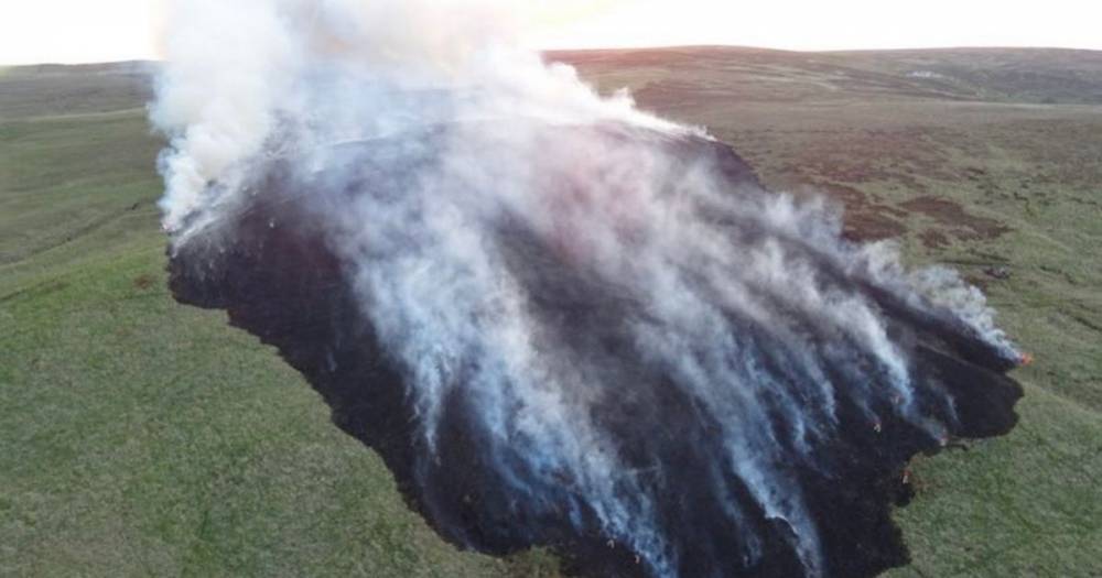 Huge fire tears through moorland north of Bolton - a barbecue could be to blame - www.manchestereveningnews.co.uk - Manchester