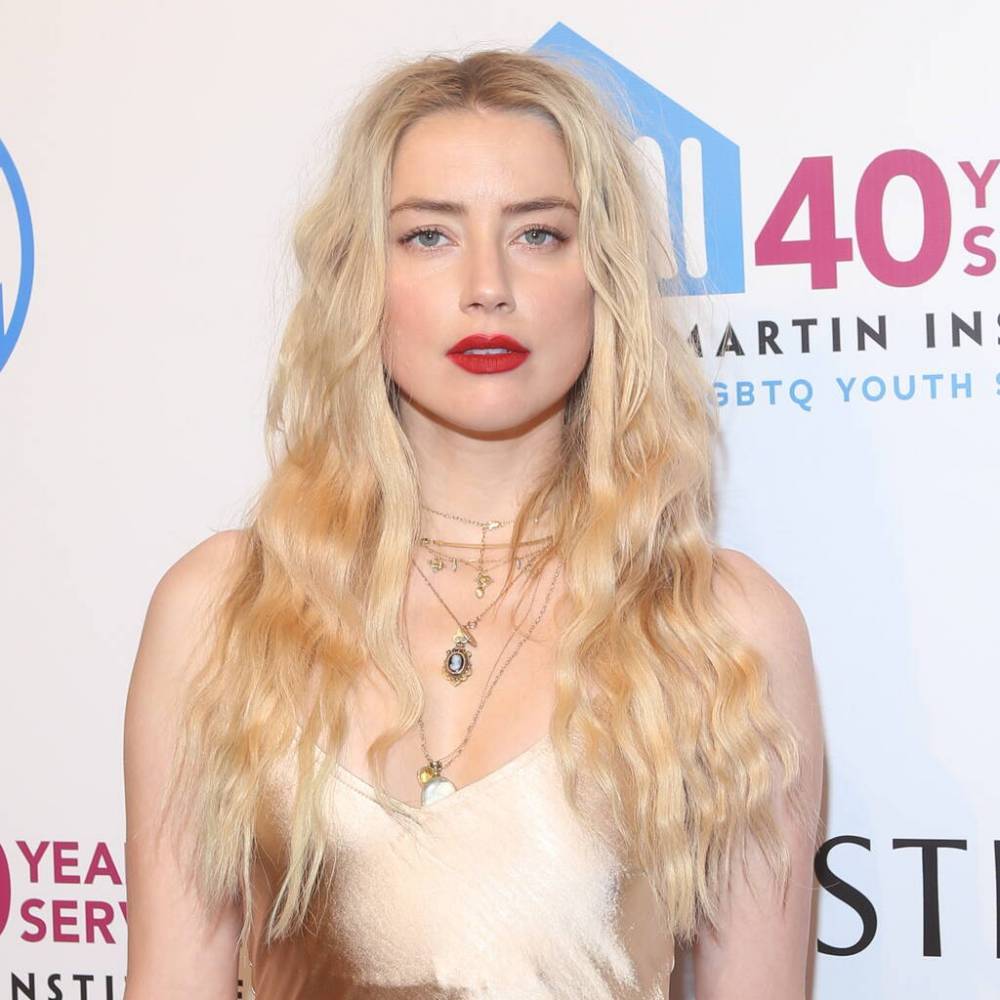 Amber Heard ‘devastated beyond belief’ by mother’s death - www.peoplemagazine.co.za