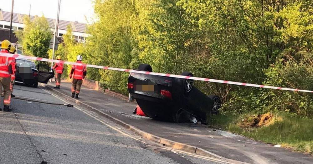 Man arrested on suspicion of drink driving after car flips onto its roof in Ardwick - www.manchestereveningnews.co.uk - Manchester