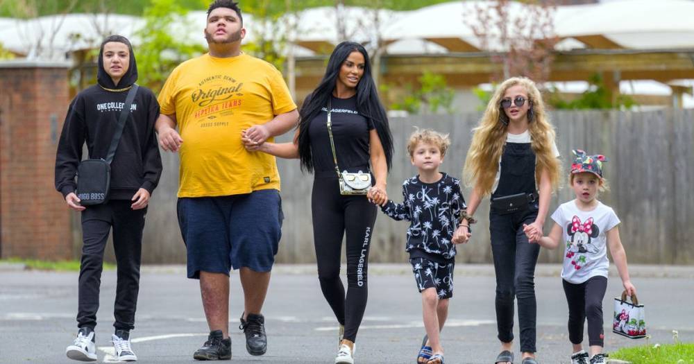 Katie Price beams as she’s reunited with her five children after six weeks in lockdown - www.ok.co.uk