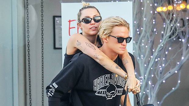 Miley Cyrus Cuddles Up To Cody Simpson In Bed As They Play ‘Never Have I Ever’ — Watch - hollywoodlife.com