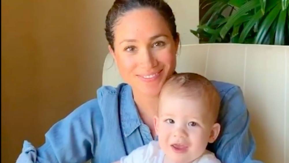 Meghan Markle Tries to Hold a Squirming Archie in Extremely Rare Birthday Storytime Video: Watch! - www.etonline.com - Britain