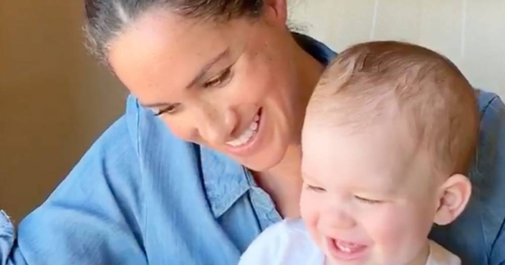 Meghan Markle’s Signature Messy Bun Makes a Return in Baby Archie’s Adorable Birthday Video - www.usmagazine.com