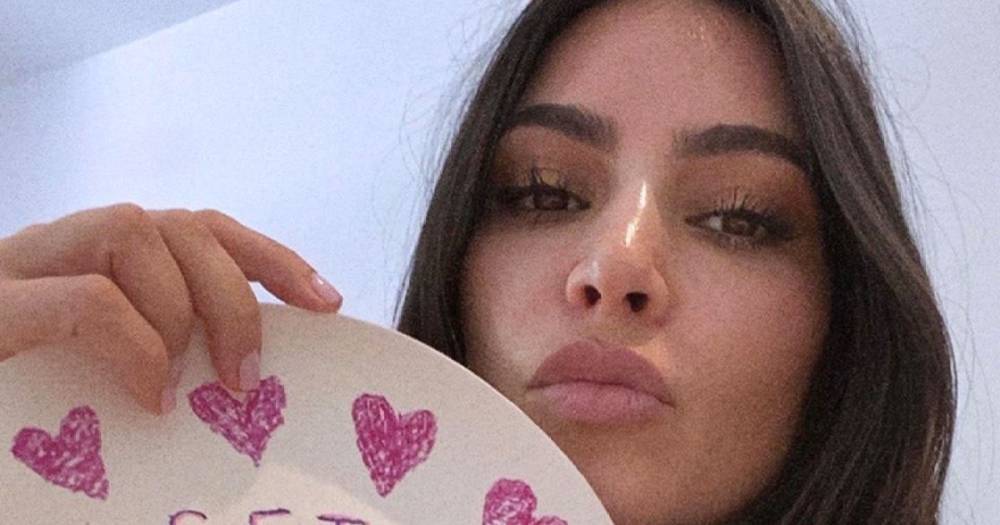 Kim Kardashian Proudly Displayed Plates Designed By Herself and Children For a Good Cause - www.usmagazine.com