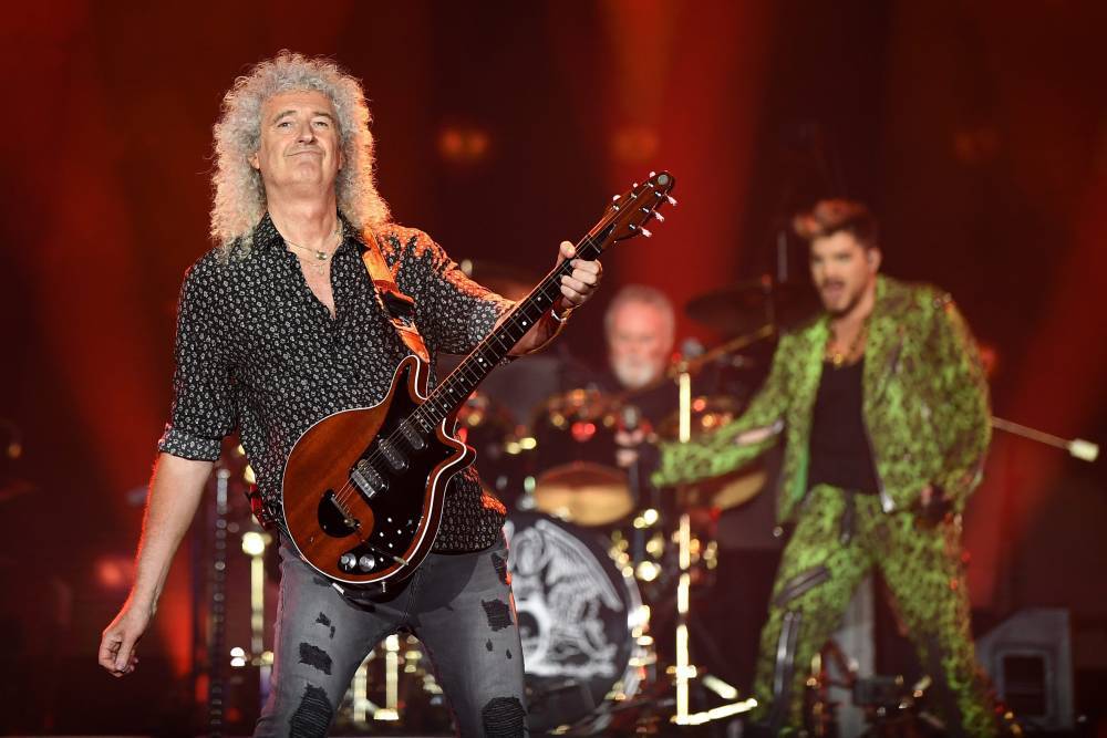 Queen Guitarist Brian May Hospitalized For Butt Injury From ‘Over-Enthusiastic Gardening’ - etcanada.com - Britain