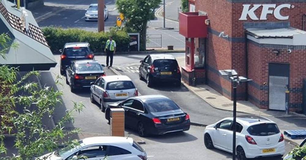 At least fifty cars formed a huge queue outside a Greater Manchester KFC over the Bank Holiday weekend - www.manchestereveningnews.co.uk - Manchester