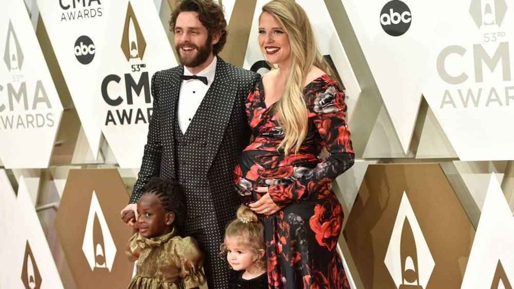 Thomas Rhett & Lauren Akins Are Teaching Daughters to 'Lead With Love In the Face of Hate' - www.etonline.com - Uganda - county Love