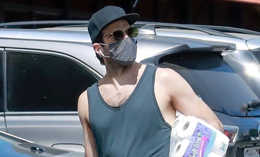 Zachary Quinto Wears Tank Shirt While Stocking Up on Toilet Paper - www.justjared.com