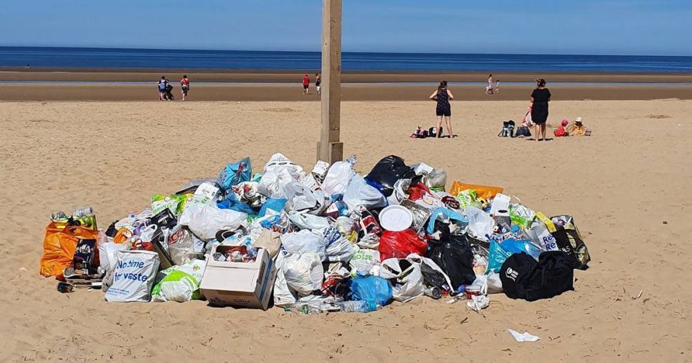Police break up 'hundreds' who turned up to overnight party on Formby beach as massive clean up from weekend continues - www.manchestereveningnews.co.uk