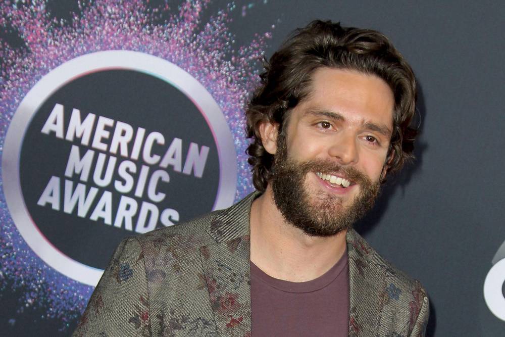 Country star Thomas Rhett takes aim at racists, fears for his daughters’ future - www.hollywood.com - USA - George - Floyd - Uganda