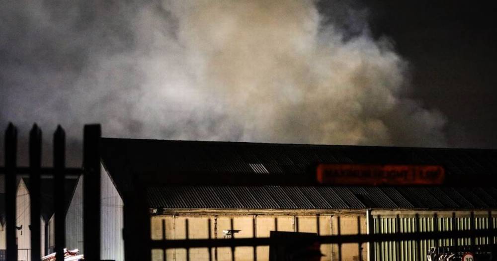 Firefighters work overnight as huge industrial estate blaze destroys building - www.manchestereveningnews.co.uk
