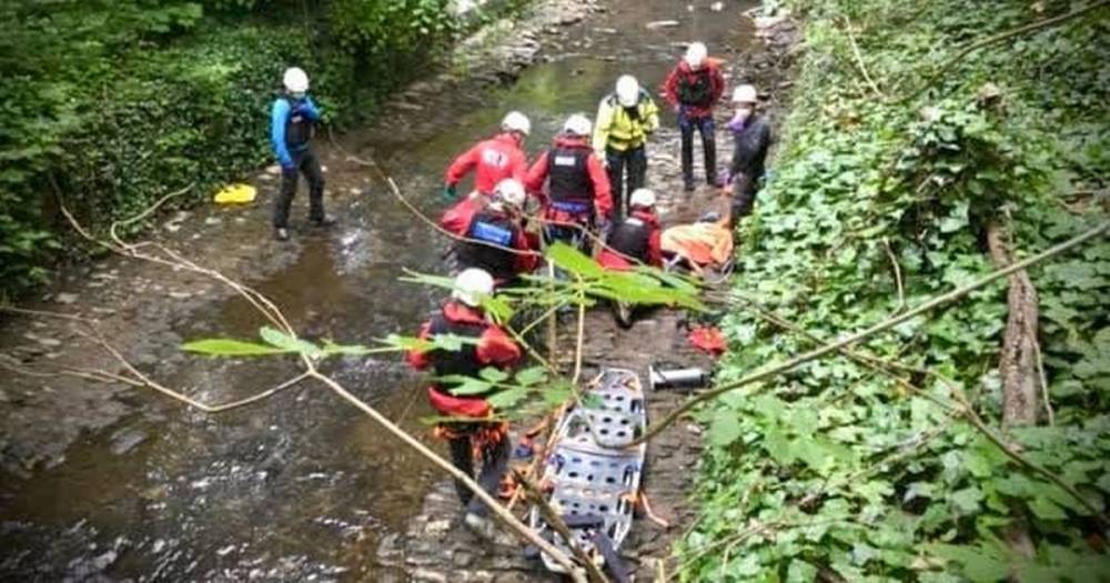 Rescue operation launched after injured man heard shouting for help from walled-in river - www.manchestereveningnews.co.uk