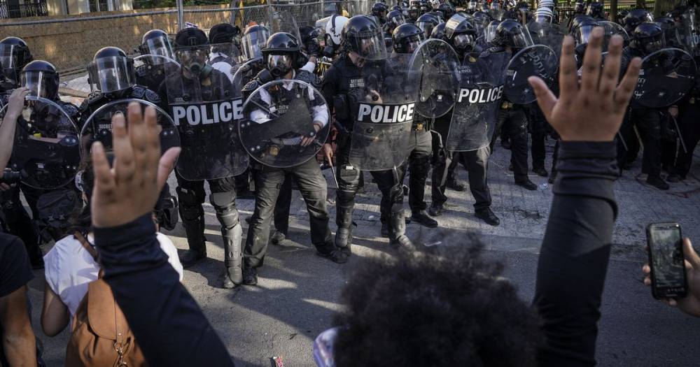 Trump threatens to bring in military as police brutality protests sparked by George Floyd death continue - www.manchestereveningnews.co.uk - USA - Minneapolis