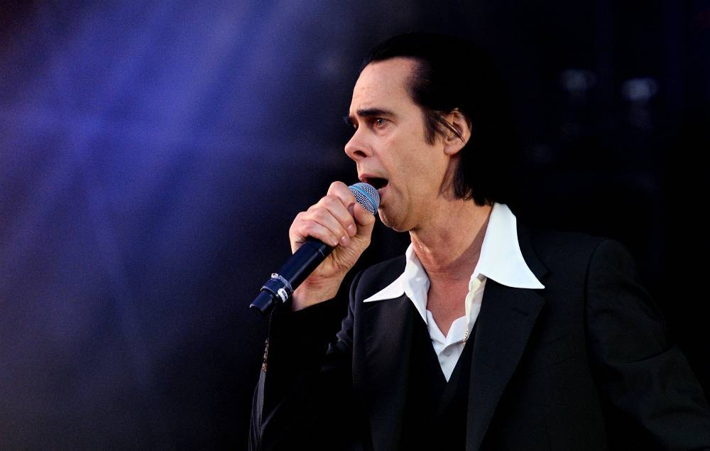 Nick Cave donates a pair of sparkly Gucci socks to help fan save venue from closure - www.nme.com