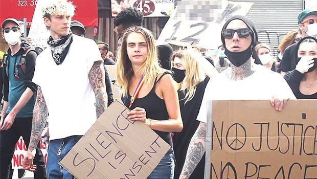 Cara Delevingne, MGK Travis Barker Protest Hold Empowering Signs Together In LA - hollywoodlife.com - Los Angeles - USA