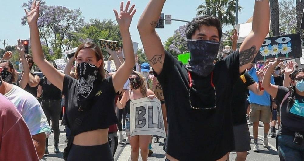 Henry Golding & Wife Liv Lo Walk with Their Hands Up During Black Lives Matter Protest - www.justjared.com - Los Angeles - state Mississippi - county Brown