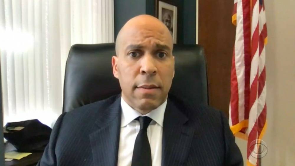 Cory Booker Says He ‘Thought Twice’ About Changing Into Regular Clothes to Walk Home in Emotional Interview - www.etonline.com - New Jersey - Columbia
