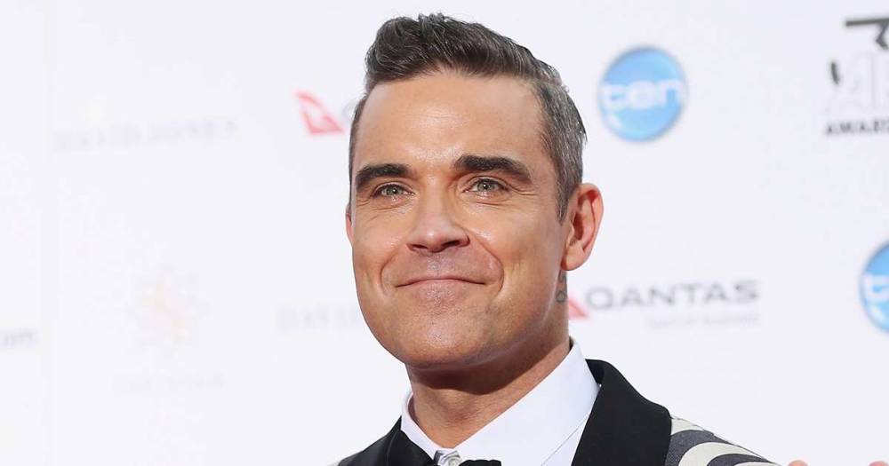 Robbie Williams debuts DIY hair transformation – but worried fans point out a mistake - www.msn.com - Los Angeles