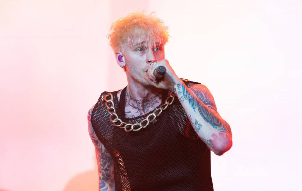 Machine Gun Kelly tells fan “I don’t want your racist money” after being criticised for protesting - www.nme.com - USA