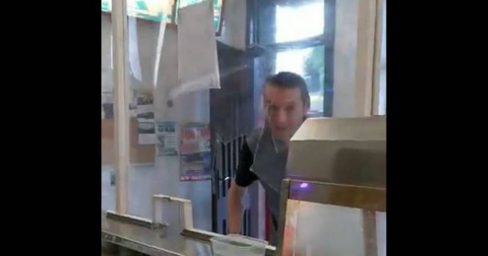 Video shows horrific moment thug smashes through protective screen at Heywood take-away - www.manchestereveningnews.co.uk - Manchester