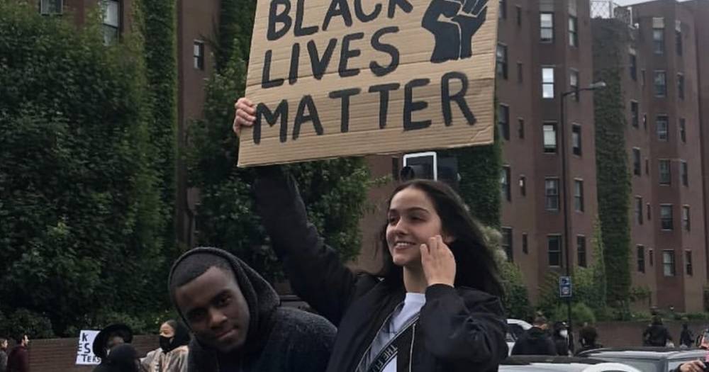 Love Island stars Siânnise Fudge and Luke Trotman wave Black Lives Matter placard as they attend march - www.ok.co.uk - Britain