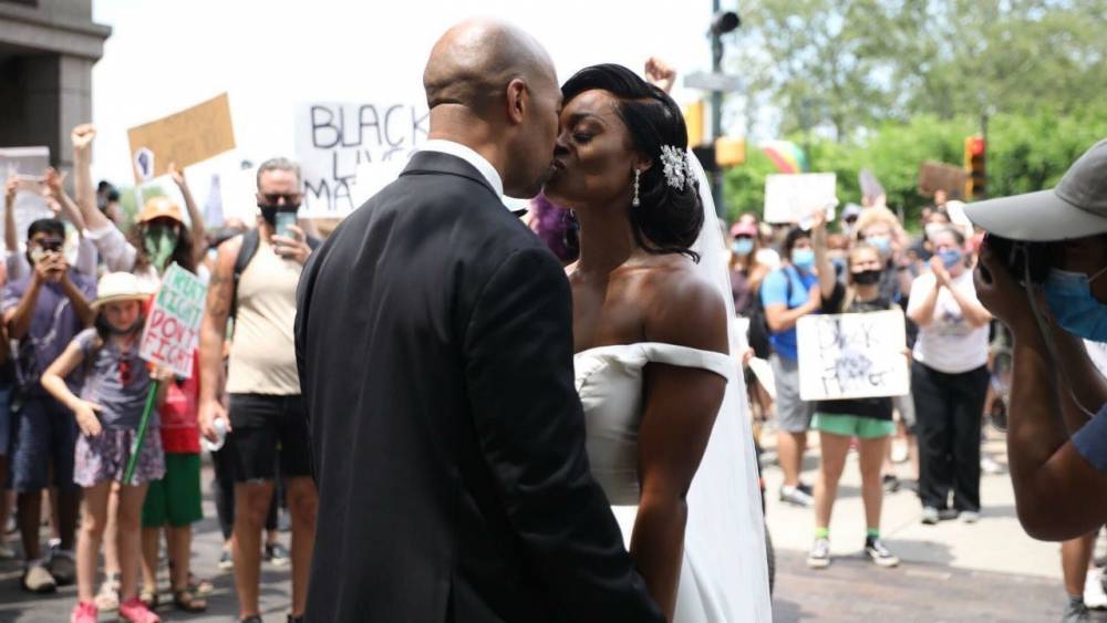 Couple Gets Married, Joins Philadelphia Protesters in Moving Moment: Watch - www.etonline.com - city Philadelphia