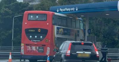 Stagecoach driver gets double-decker bus stuck under petrol station roof - www.dailyrecord.co.uk