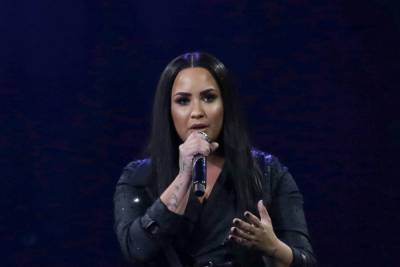 Demi Lovato reflects on broken engagement in new self-love anthem - www.hollywood.com