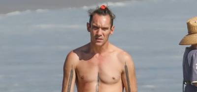 Jonathan Rhys Meyers Goes Shirtless at the Beach in Rare Photos - www.justjared.com - Malibu