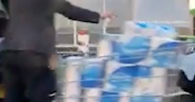 Moment 'panic buying' shopper fills trolley with 100 toilet rolls at Asda - www.dailyrecord.co.uk