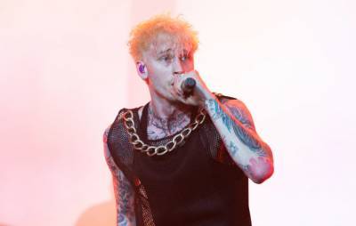 Machine Gun Kelly says some artists “fucking cry about everything as a marketing tool” - www.nme.com