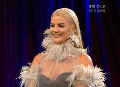 Lyra just wore the most fabulous feathered dress by Irish designer Helen Cody - evoke.ie - Ireland