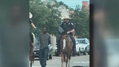 Texas man seeks $1M after viral photo shows mounted officers leading him by rope - www.foxnews.com - Texas - Houston