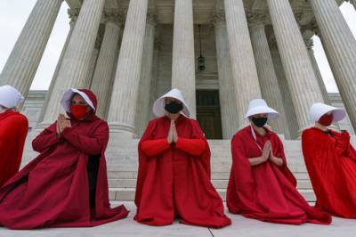 Amy Coney Barrett Confirmation Battle Already Marked By ‘The Handmaid’s Tale’ Protesters - deadline.com