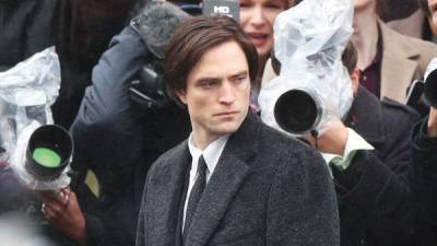 Robert Pattinson pictured filming funeral scene for The Batman in Liverpool - www.breakingnews.ie - county Hall