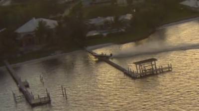 Runaway boat in Florida goes airborne, crashes into dock after 'photo shoot' goes awry - www.foxnews.com - Florida - county Martin