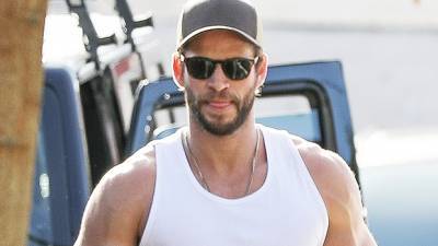 Liam Hemsworth Puts His Buff Arm Muscles On Display In Tank Top During Intense Workout — Pics - hollywoodlife.com