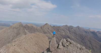 Footage shows daredevil BASE jumpers leaping from Cuillin Ridge on Skye - www.dailyrecord.co.uk