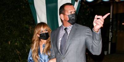 Jennifer Lopez Steps Out with A-Rod, Shows Off Fresh Wispy Bangs and a Blue Satin Suit - www.harpersbazaar.com