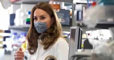 Kate Middleton stuns in blue dress and lab coat as she looks at cells and speaks to charity - www.ok.co.uk - London