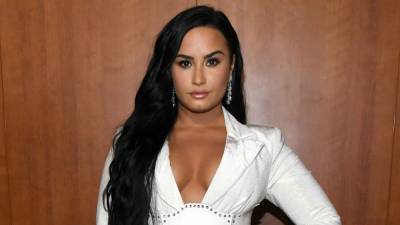 Demi Lovato Tells Critics She 'Doesn't Care' If New Political Song 'Ruins' Her Career - www.etonline.com