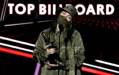 Billie Eilish urges fans to “please vote and wear a mask” while accepting Billboard Music award - www.nme.com - Los Angeles