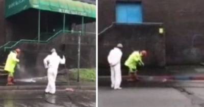 Watch Rangers fans help clean up graffiti-hit Celtic club after Old Firm game - www.dailyrecord.co.uk - city Irvine