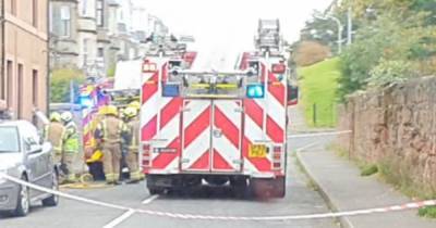 Emergency services race to Ardrossan street as fire rages in ground floor flat - www.dailyrecord.co.uk