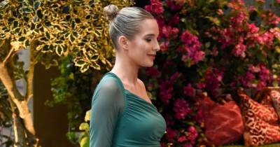 Helen Flanagan flaunts blossoming baby bump in green dress after admitting pregnancy struggles - www.ok.co.uk - Manchester
