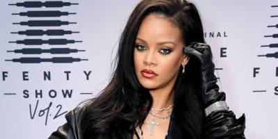 Here's Rihanna Looking Amazing in a Sheer Bra, Leather Blazer, Fishnets, and No Pants - www.marieclaire.com