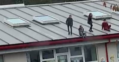 Youths trash primary school playground and climb onto roof - www.manchestereveningnews.co.uk