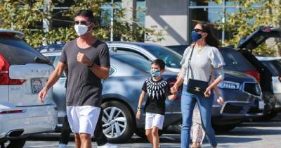 Simon Cowell seen walking with his family for first time since breaking his back in horrific bike accident - www.ok.co.uk - Britain