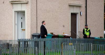 Cops stand guard as murder probe continues into ‘horrendous’ death of Airdrie man - dailyrecord.co.uk - county Rankin